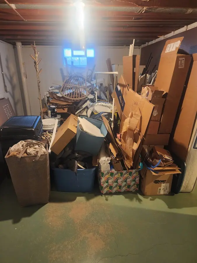 Roll-off dumpster container at job site for 40 Yard Dumpster Rental in Manila